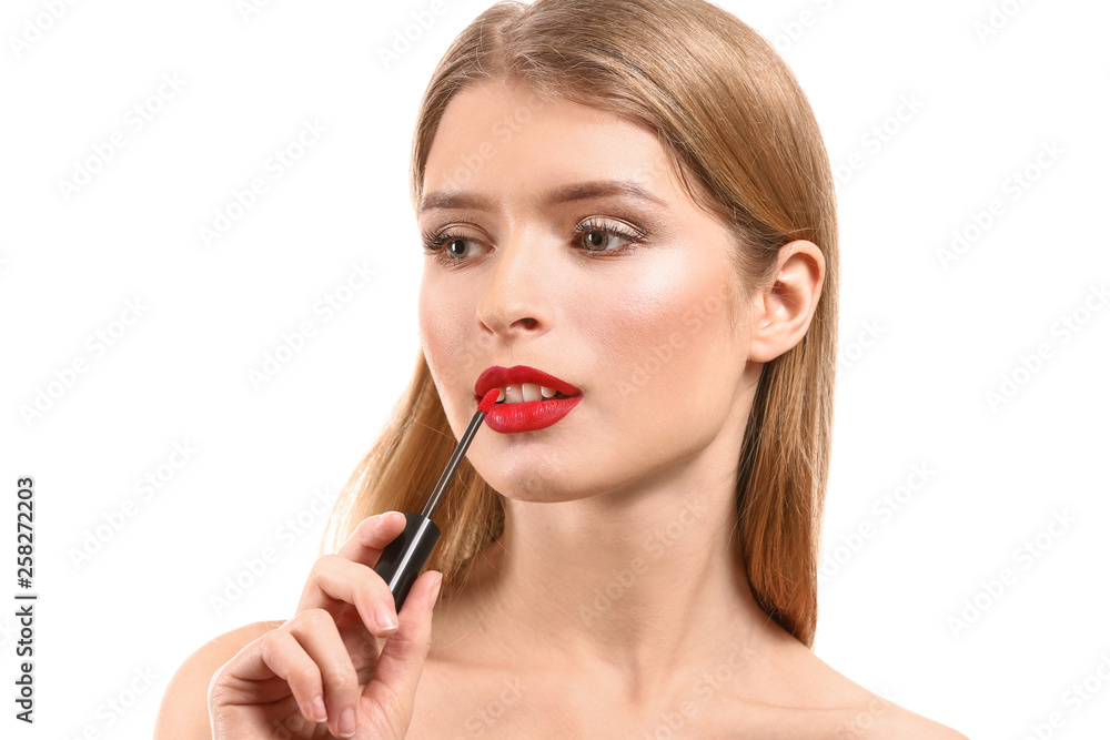 Beautiful young woman with bright lipstick on white background Beautiful young woman with bright lipstick on white background