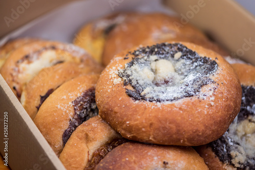 Sweet tastefull traditional cakes with jam, fruit, cottage cheese and poppy seeds. photo