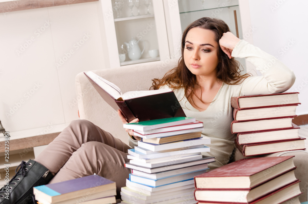 Young female student preparing for exams at home Young female student preparing for exams at home