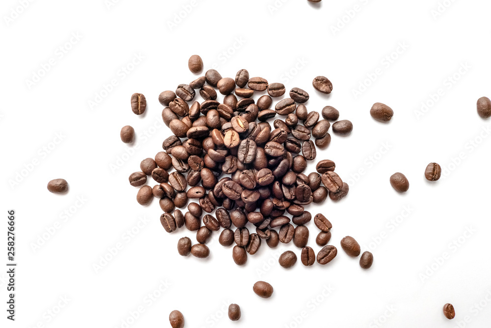 Roasted coffee beans isolated on white background. Close-up. Roasted coffee beans isolated on white background. Close-up.