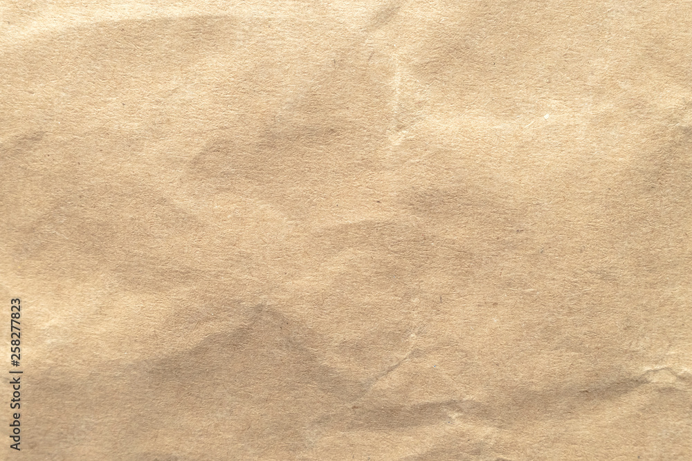 Naklejka premium Brown crumpled paper texture background.