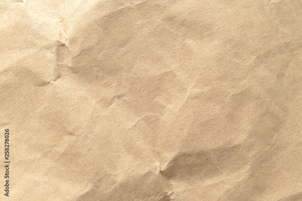 Fototapeta premium Brown crumpled paper texture background.