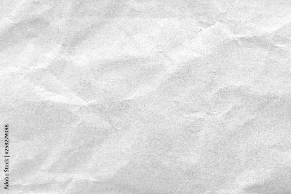White crumpled paper texture background. Close-up. White crumpled paper texture background. Close-up.