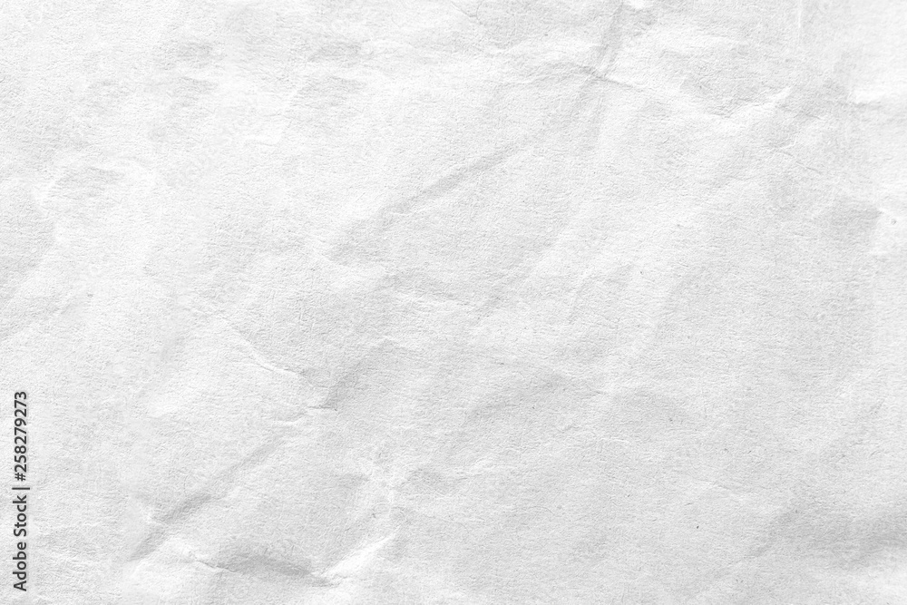 White crumpled paper texture background. Close-up. White crumpled paper texture background. Close-up.