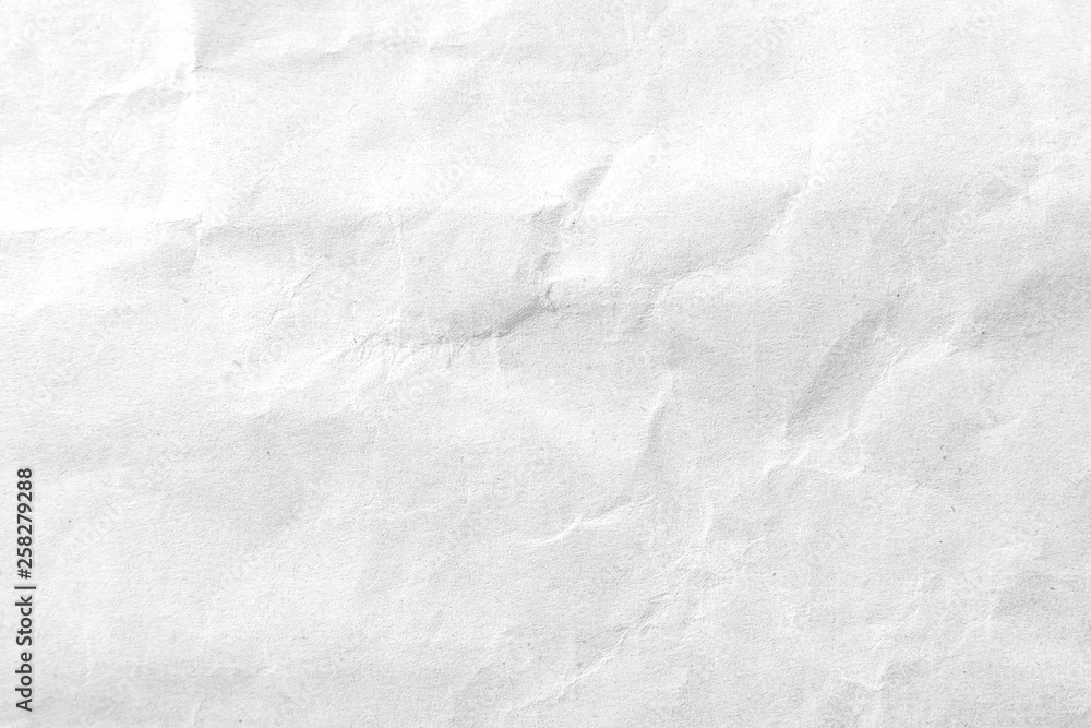 White crumpled paper texture background. Close-up. White crumpled paper texture background. Close-up.