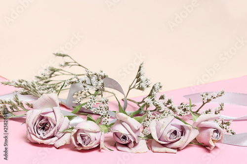 Fototapeta Naklejka Na Ścianę i Meble -  Vintage roses and white flowers on the pink background
