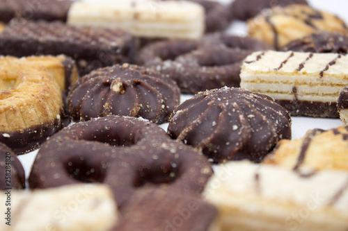 Cookies with chocolate on a white background.