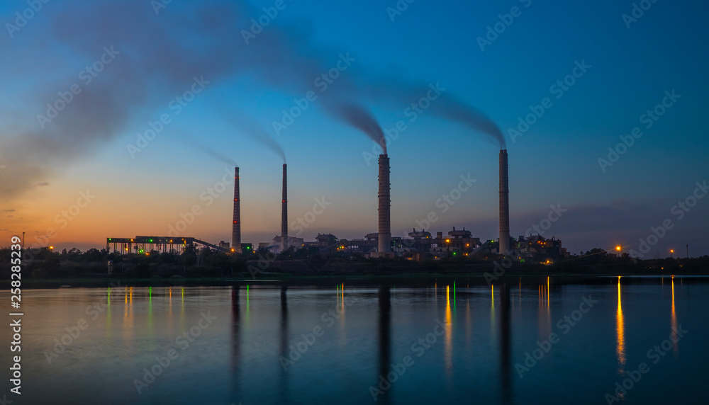 india ,Bundi,  factory, pollution,smoke, reflection