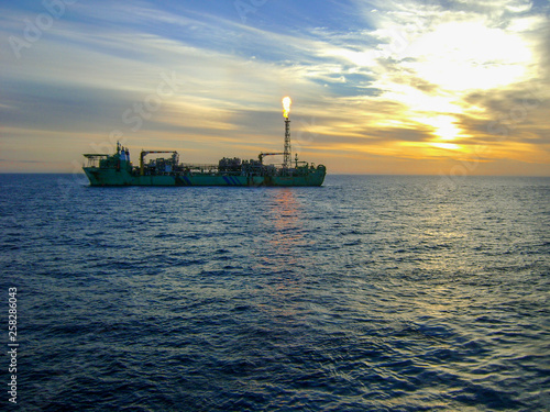 Canvastavla FPSO flaring offshore agains beautiful sunset