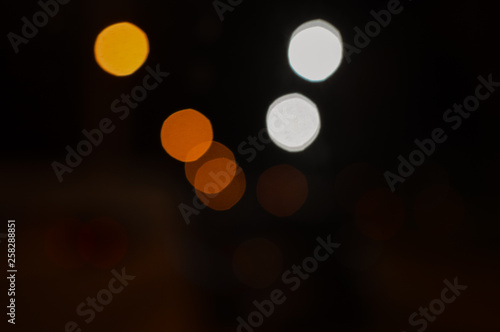 Blurry abstract light night city bokeh background. © aquar