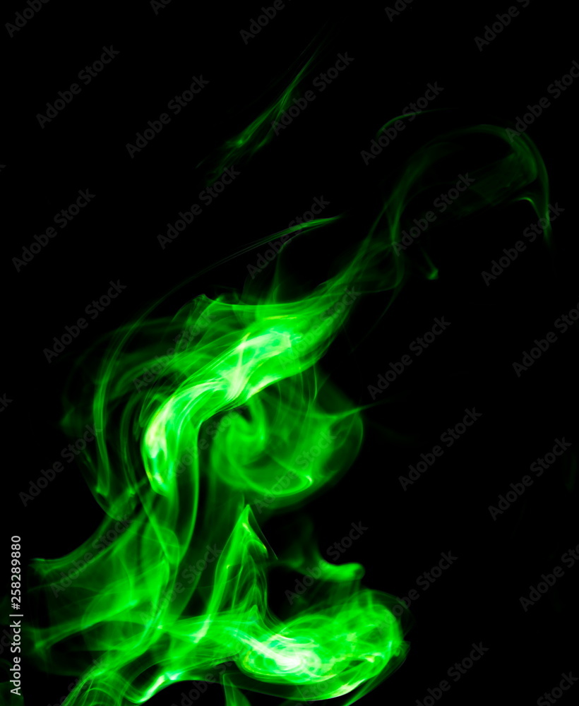 Green smoke on black background Green smoke on black background