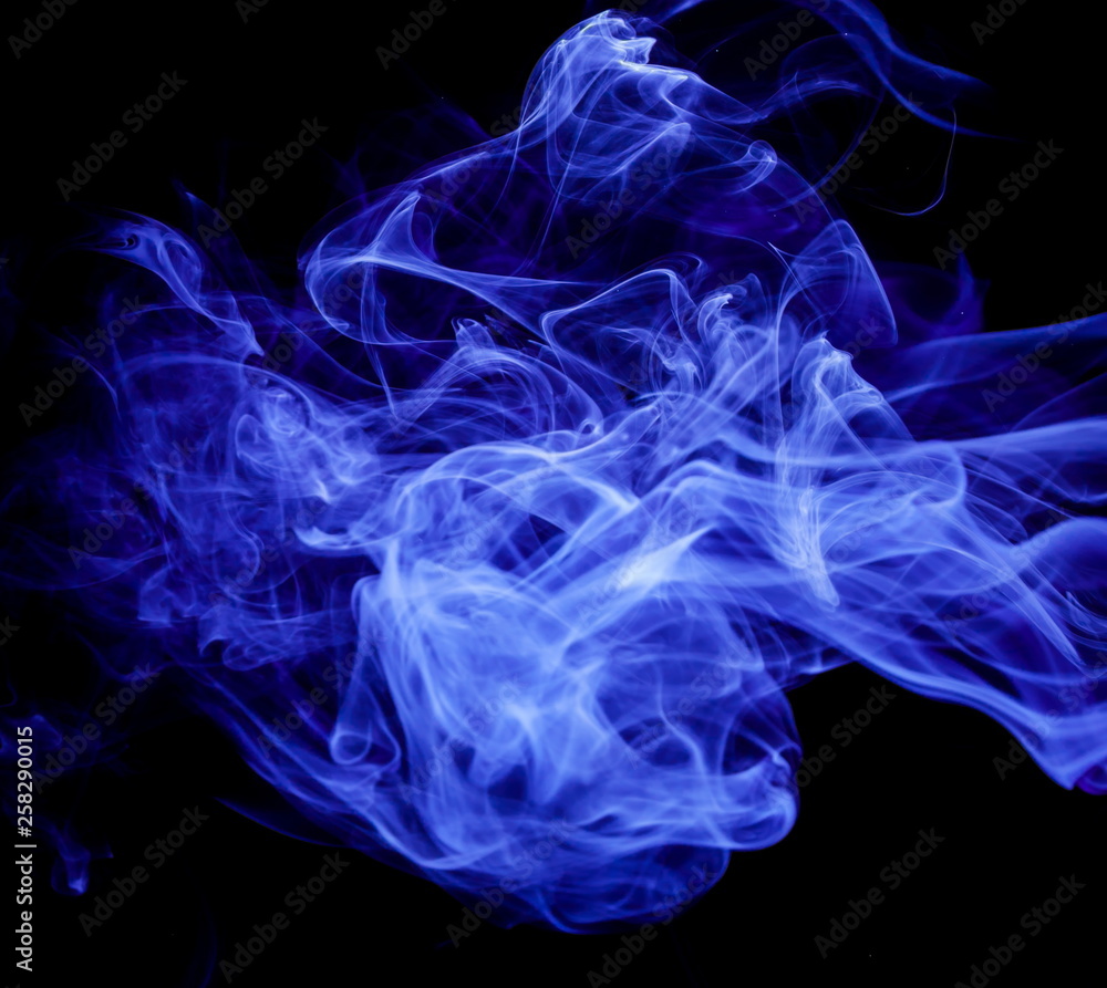 Obraz premium Blue smoke on black background