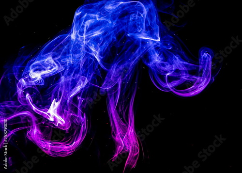 Fototapeta Naklejka Na Ścianę i Meble -  Colored smoke on black background