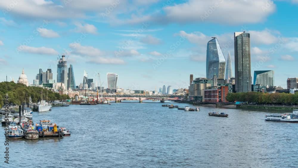 Time lapse view of river Thames, Blackfriars bridge, Southbank, the City of London and Canary Wharf in the distance. Time lapse view of river Thames, Blackfriars bridge, Southbank, the City of London and Canary Wharf in the distance.