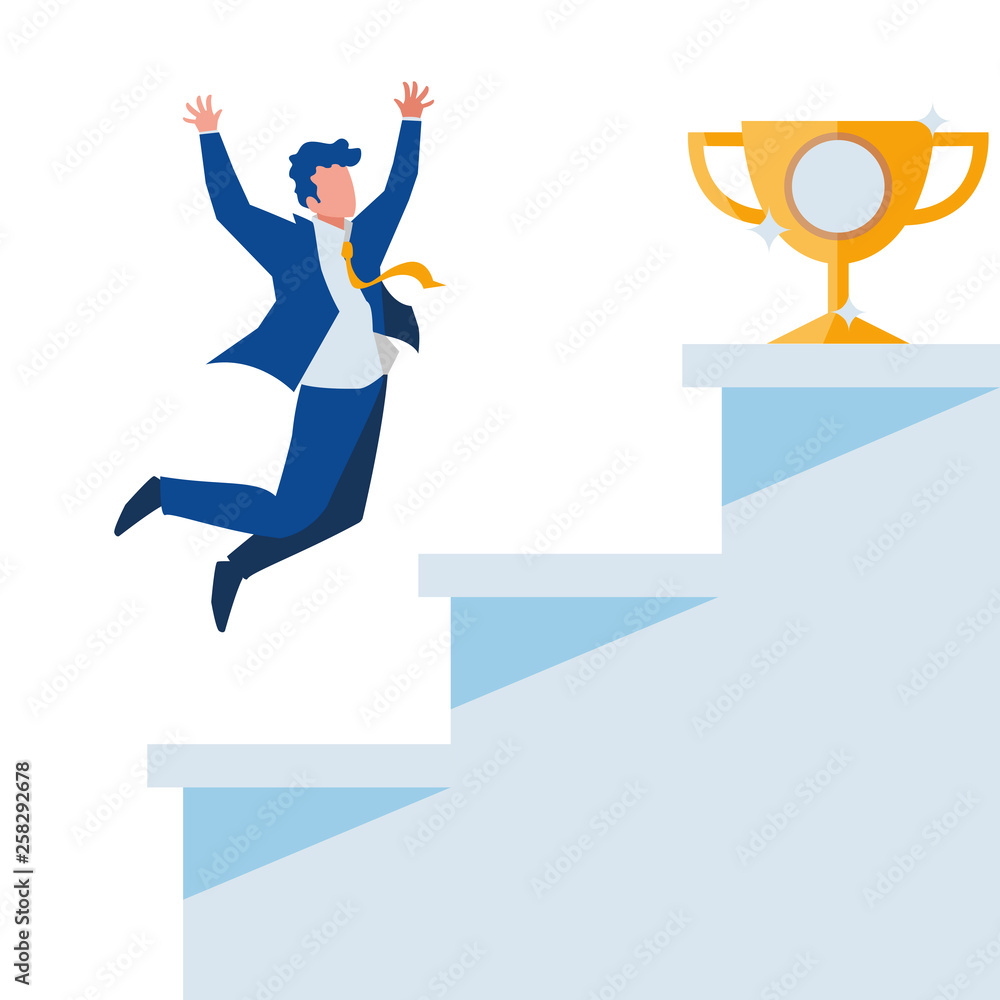 elegant businessman celebrating with trophy and stairs