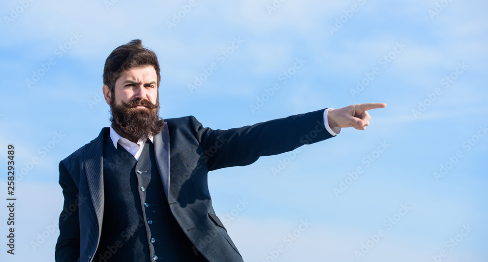 This way. Changing course. Business direction. Looking for opportunities and chances. Man formal suit manager looking direction. Developing business direction. Businessman bearded face sky background This way. Changing course. Business direction. Looking for opportunities and chances. Man formal suit manager looking direction. Developing business direction. Businessman bearded face sky background