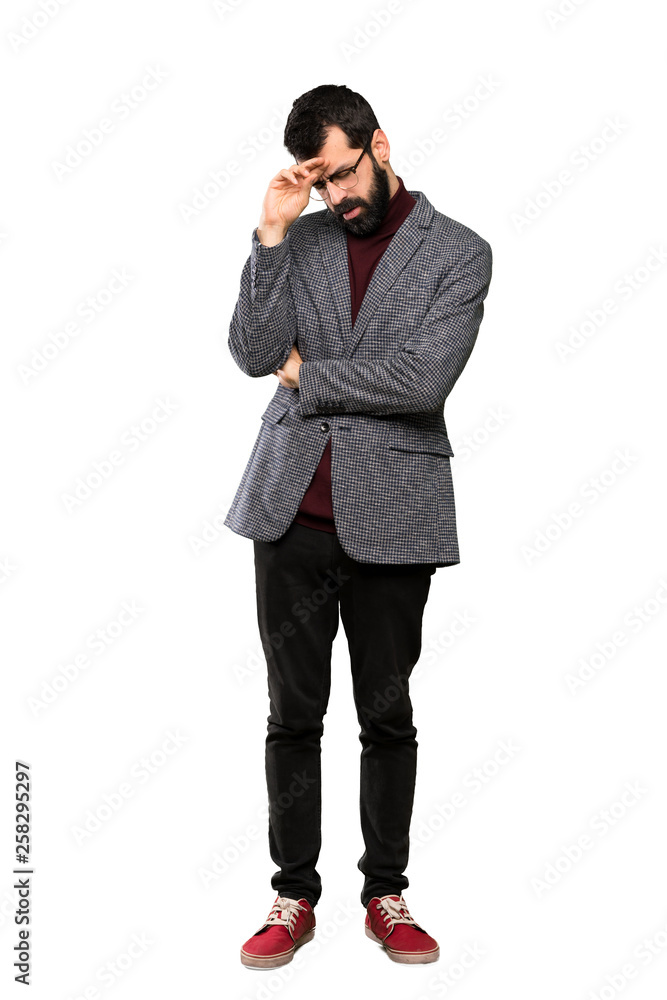 Handsome man with glasses with tired and sick expression over isolated white background Handsome man with glasses with tired and sick expression over isolated white background