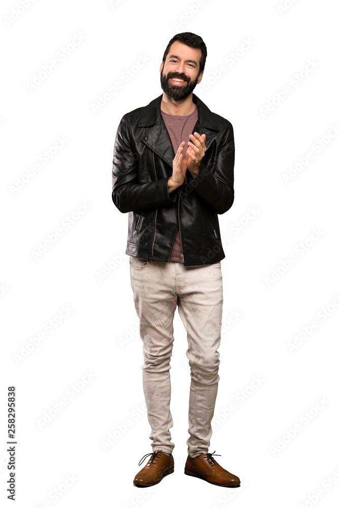 Handsome man with beard applauding after presentation in a conference over isolated white background Handsome man with beard applauding after presentation in a conference over isolated white background