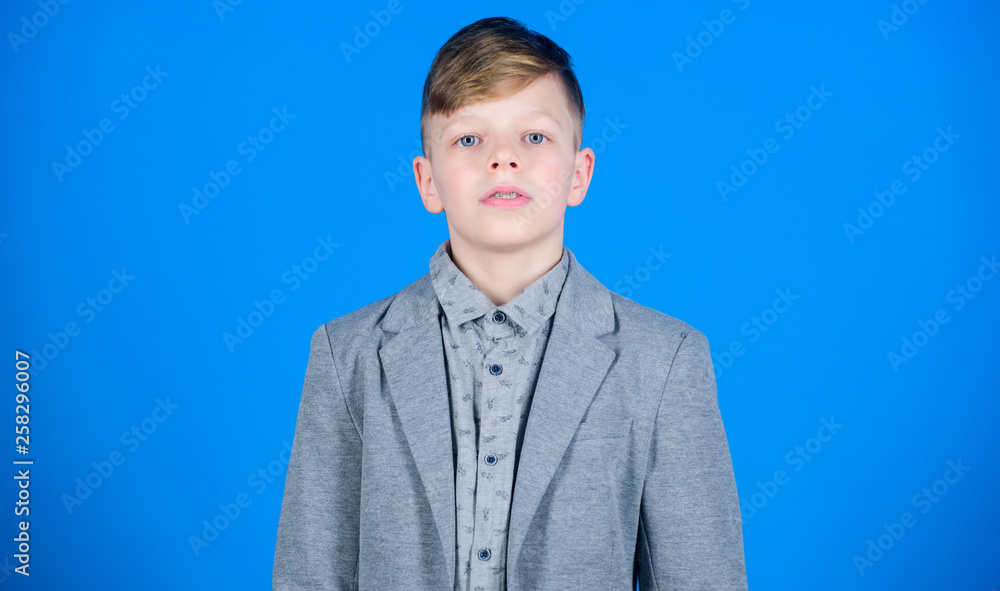 Confident guy enjoy fashionable outfit. Try being handsome and stylish. Wish to grow up faster. Know lot about style. Found his style. Boy modern hairstyle wear formal style suit blue background Confident guy enjoy fashionable outfit. Try being handsome and stylish. Wish to grow up faster. Know lot about style. Found his style. Boy modern hairstyle wear formal style suit blue background