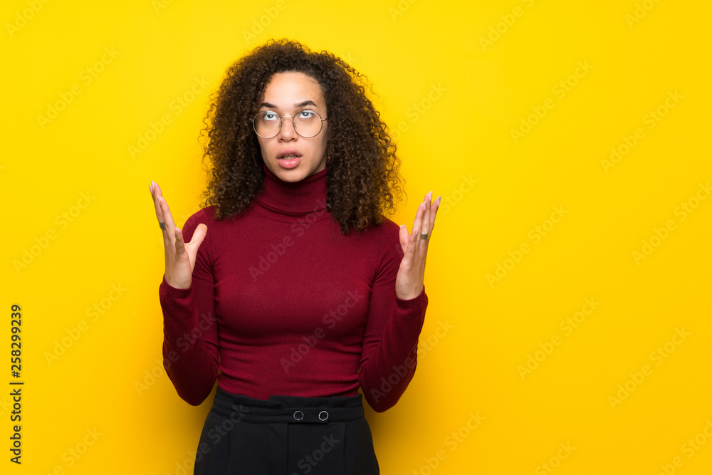 Dominican woman with turtleneck sweater frustrated by a bad situation Dominican woman with turtleneck sweater frustrated by a bad situation