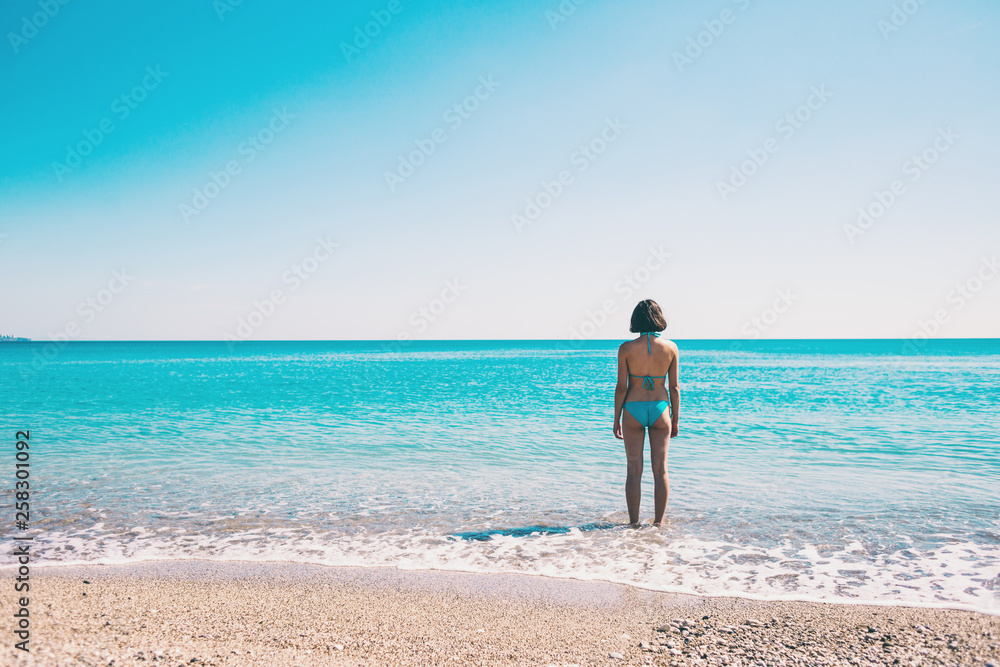 Woman on the beach.