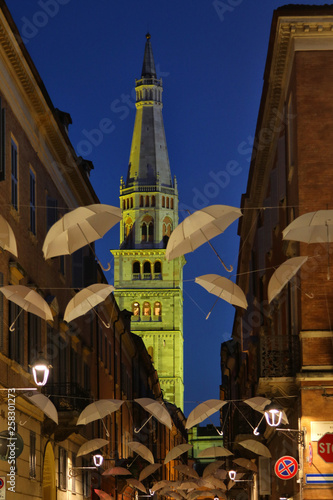 Modena  Emilia Romagna  Italy  Ghirlandina tower with yellow lights  Unesco world heritage site
