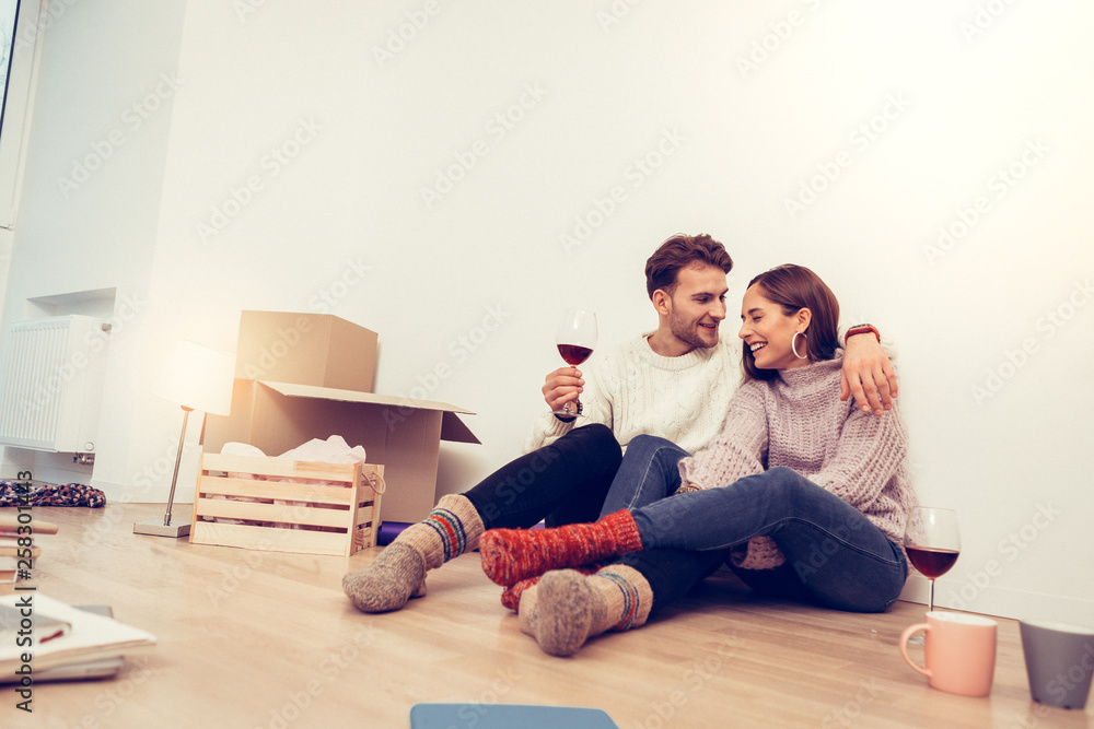 Just married couple spending their first evening in new house Just married couple spending their first evening in new house