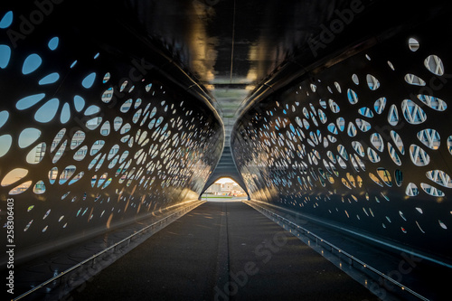 ANTWERP, BELGIUM - 02 15 2019: Parkbrug tunnel bridge - Interior of Park Bridge, a pedestrian and cyclist bridge that connects Park Spoor Noord over the Noorderplaats with Het Eilandje