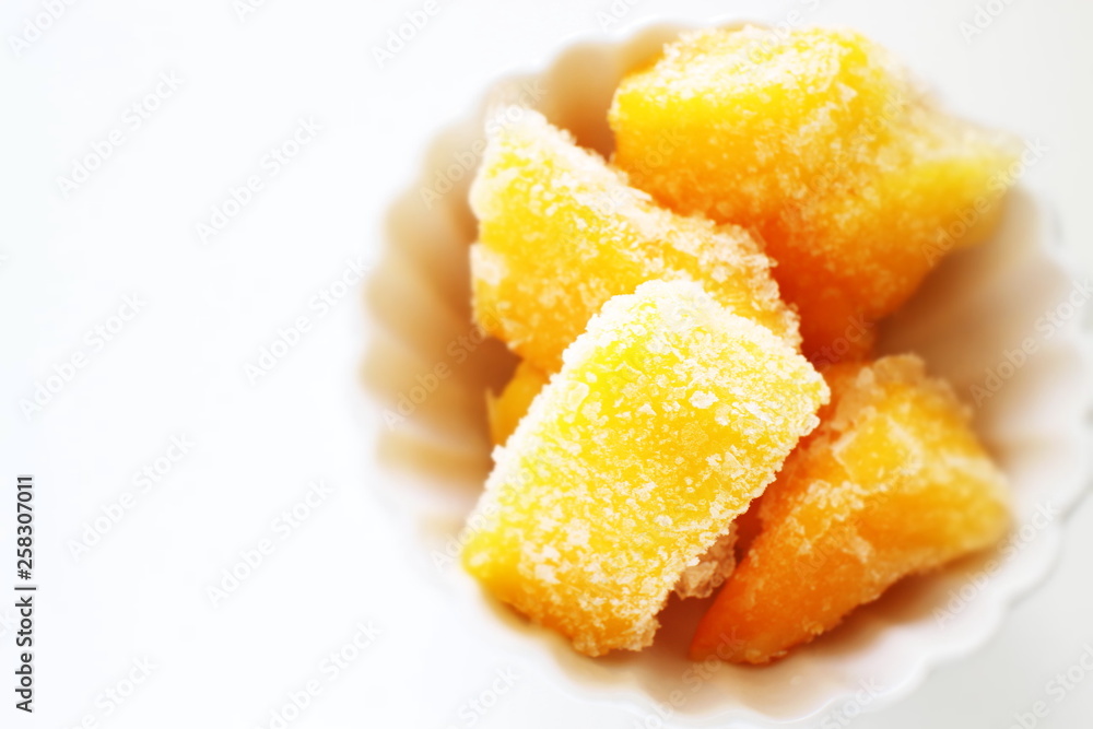 Frozen mango with copy space for healthy food ingredient image Frozen mango with copy space for healthy food ingredient image