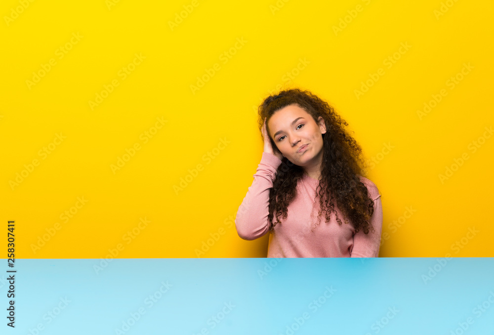 Teenager girl with an expression of frustration and not understanding Teenager girl with an expression of frustration and not understanding