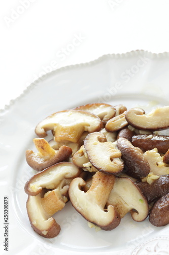 sliced shiitake mushroom sauteed photo