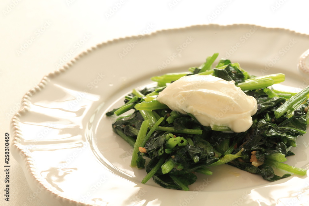 Spinach sauteed served with mascarpone cheese Spinach sauteed served with mascarpone cheese