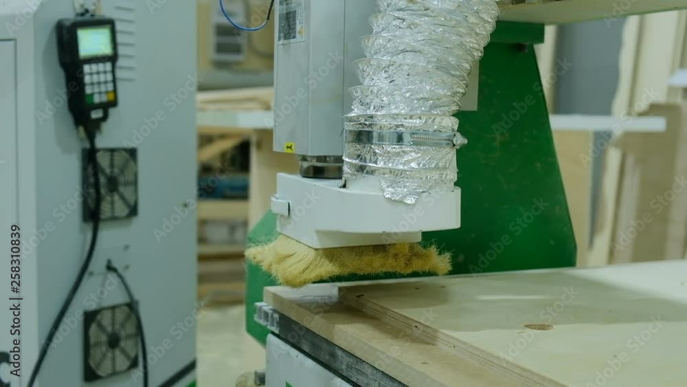 Modern woodworking cnc machine mills plywood sheet, production of wooden furniture Modern woodworking cnc machine mills plywood sheet, production of wooden furniture