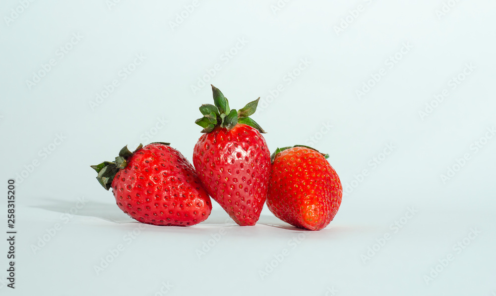 fresh strawberries. white background. crop 2019. one or several fresh strawberries. white background. crop 2019. one or several