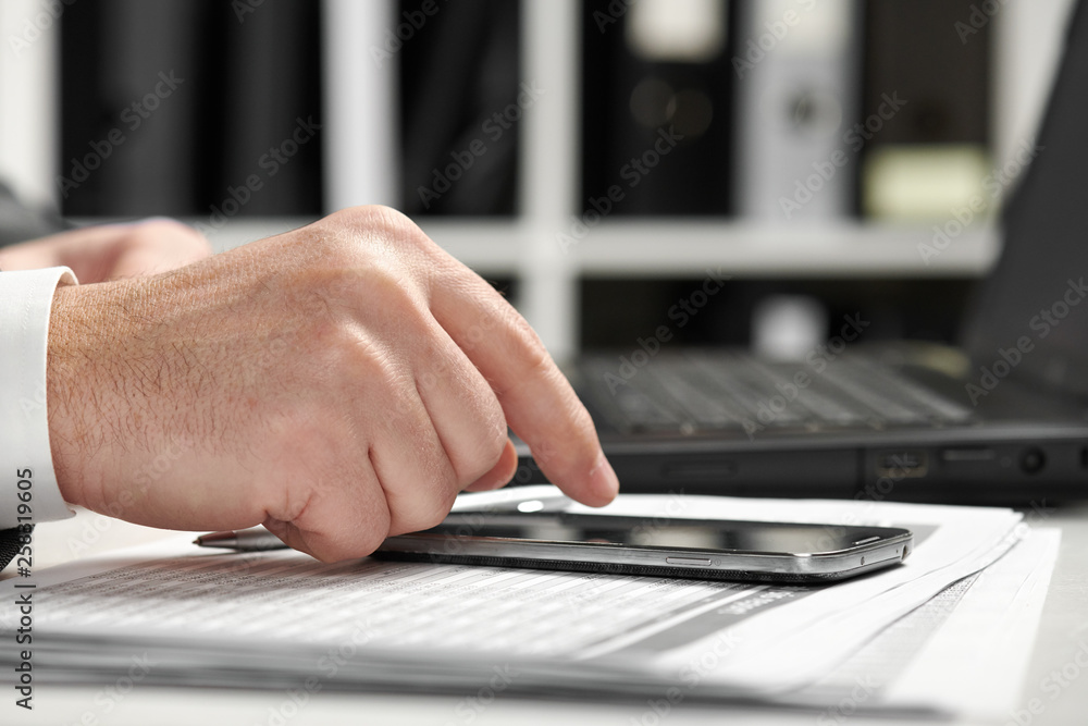 Businessman working in an office. Hands closeup. Businessman working in an office. Hands closeup.