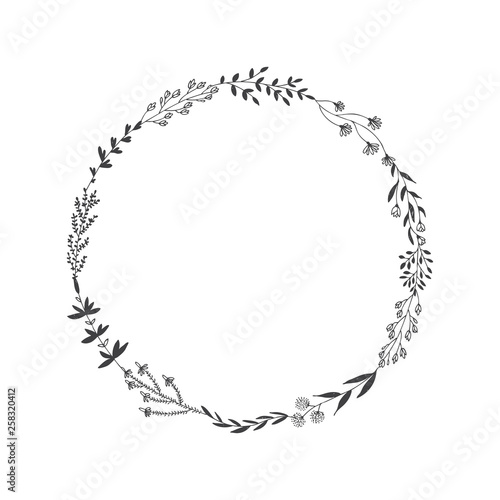 Hand drawn vector round frame with floral elements, herbs, leaves, flowers, twigs, branches