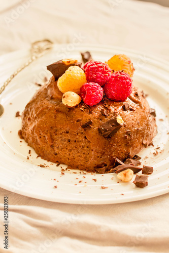 Chocolate mousse with raspberries. Diet detox food concept.