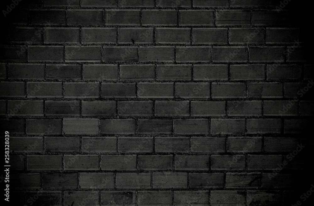 Gray brick wall with dark vignette borders