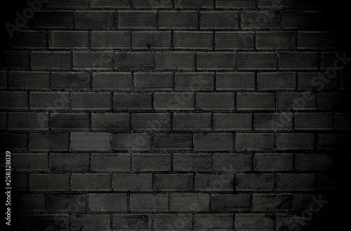 Gray brick wall with dark vignette borders
