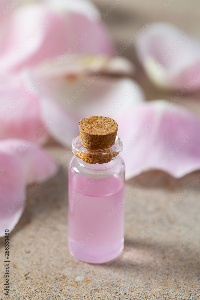 rose water in a glass bottle rose water in a glass bottle