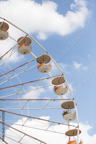 Ferris wheel container in blue sky