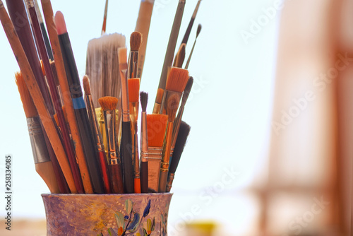 Paint brushes in a glass