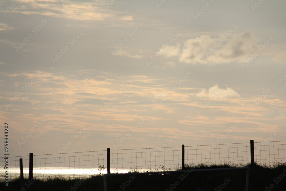 Silhouette of a fence