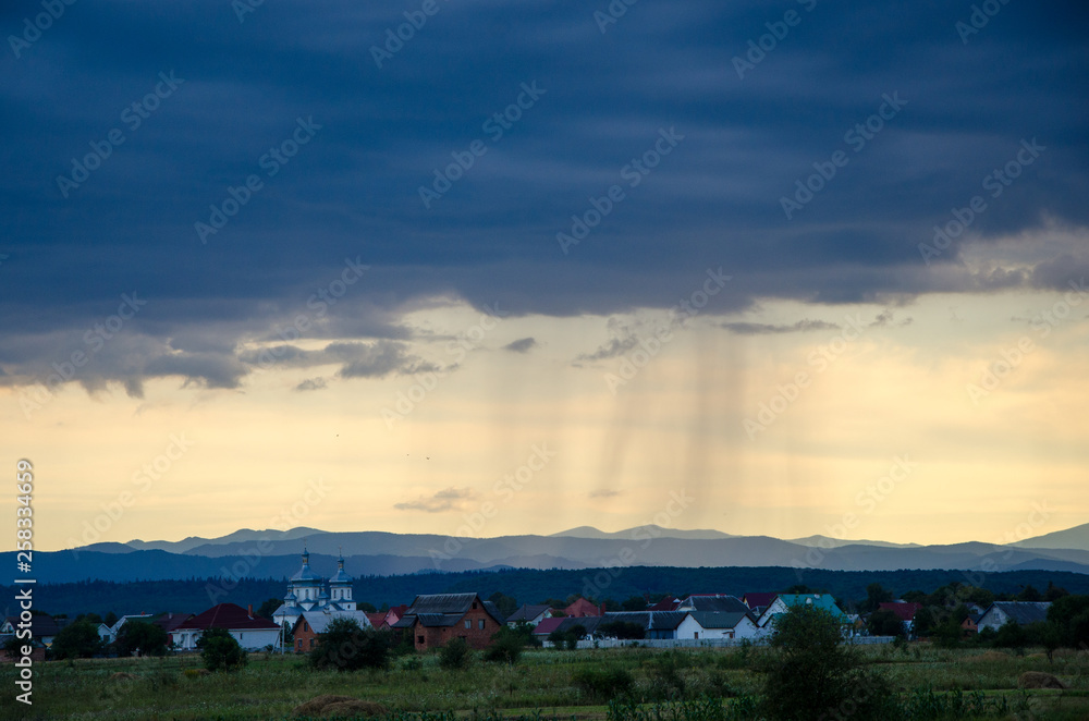Storm clouds in the sky with rain in the Carpathians