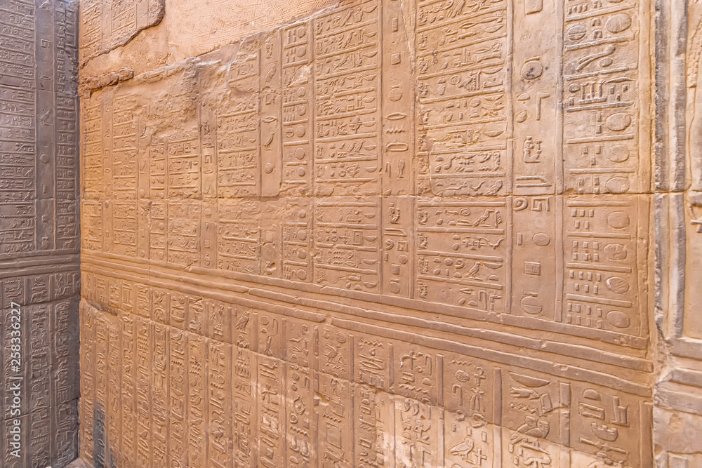 Hieroglyphs of old calendar in Ruins of the Temple of Kom Ombo in the Nile river, Egypt Hieroglyphs of old calendar in Ruins of the Temple of Kom Ombo in the Nile river, Egypt