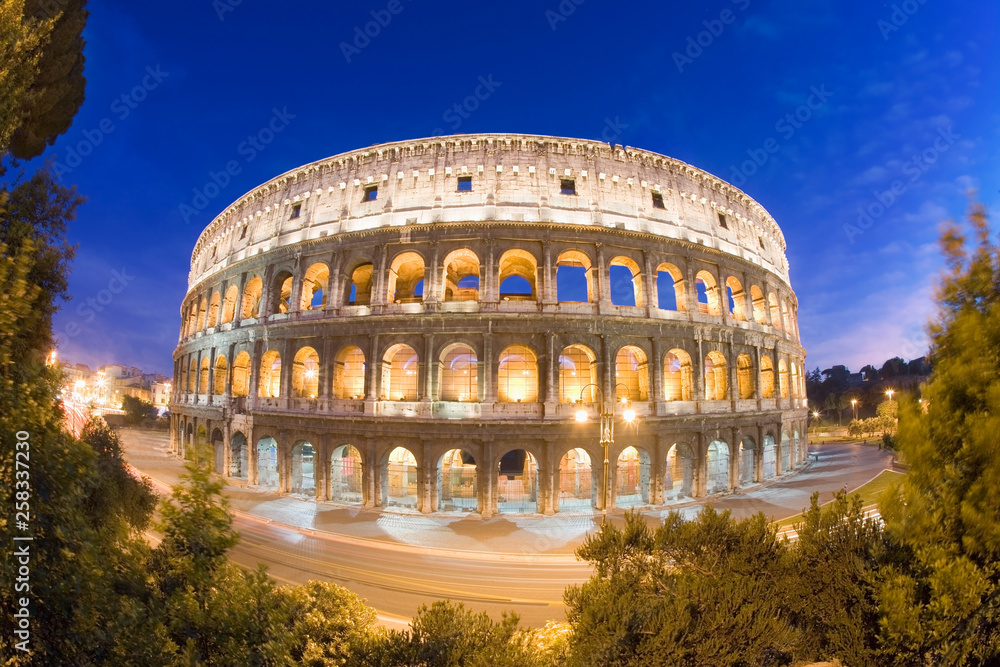Elevated view of the Colosseum at dusk rome italy