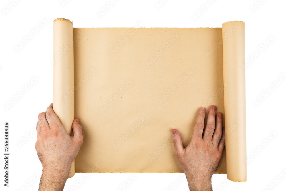 Obraz premium Man hands holding old worn paper scroll