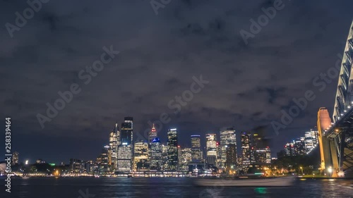 Wallpaper Mural Timelapse of Sydney, Australia at night with the famous Sydney Opera House and the Sydney Harbour Bridge. Torontodigital.ca