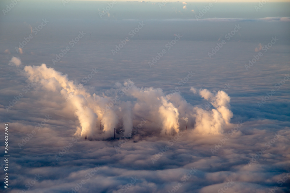 Chimneys and clouds from above in Cologne Germany