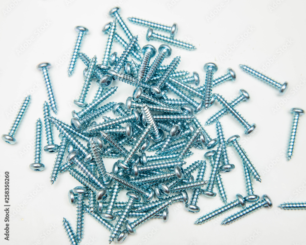 pile of metal screws pile of metal screws